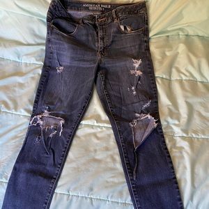TWO PAIRS OF AMERICAN EAGLE JEANS